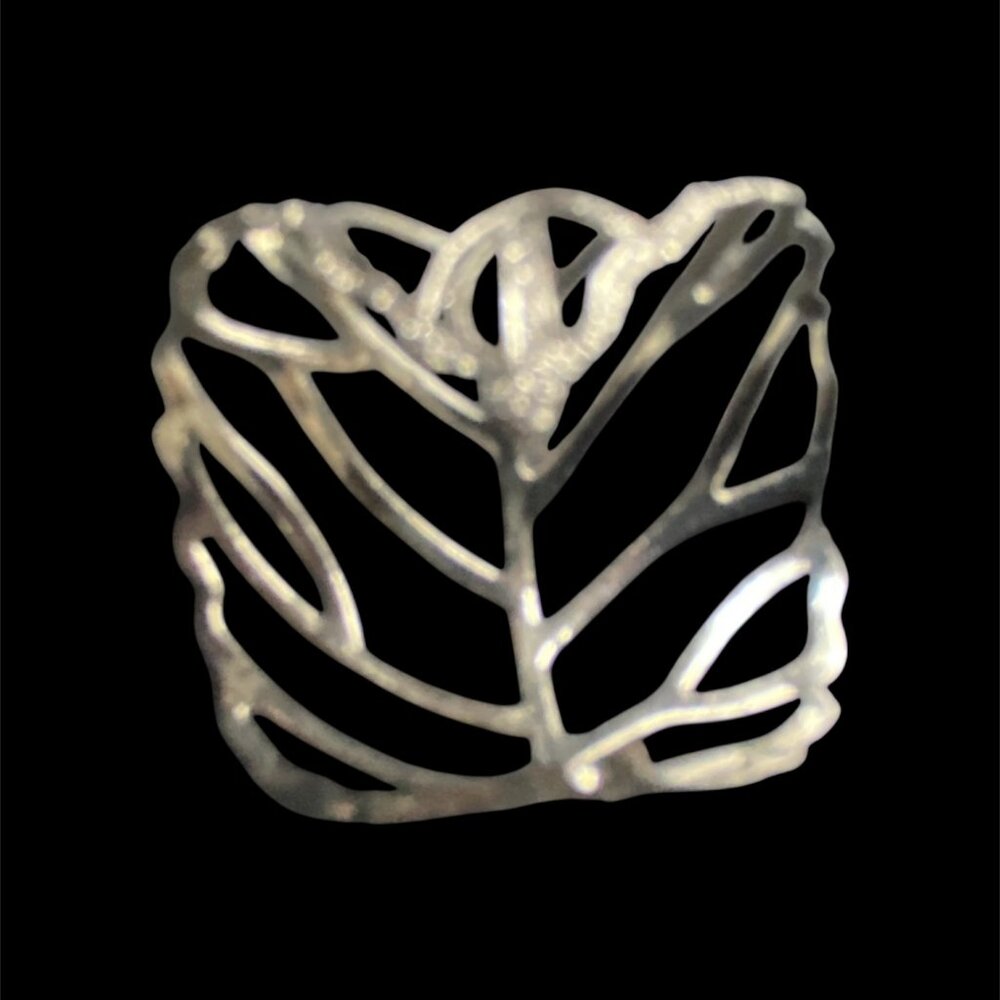 Silver tone ring - hollowed out design